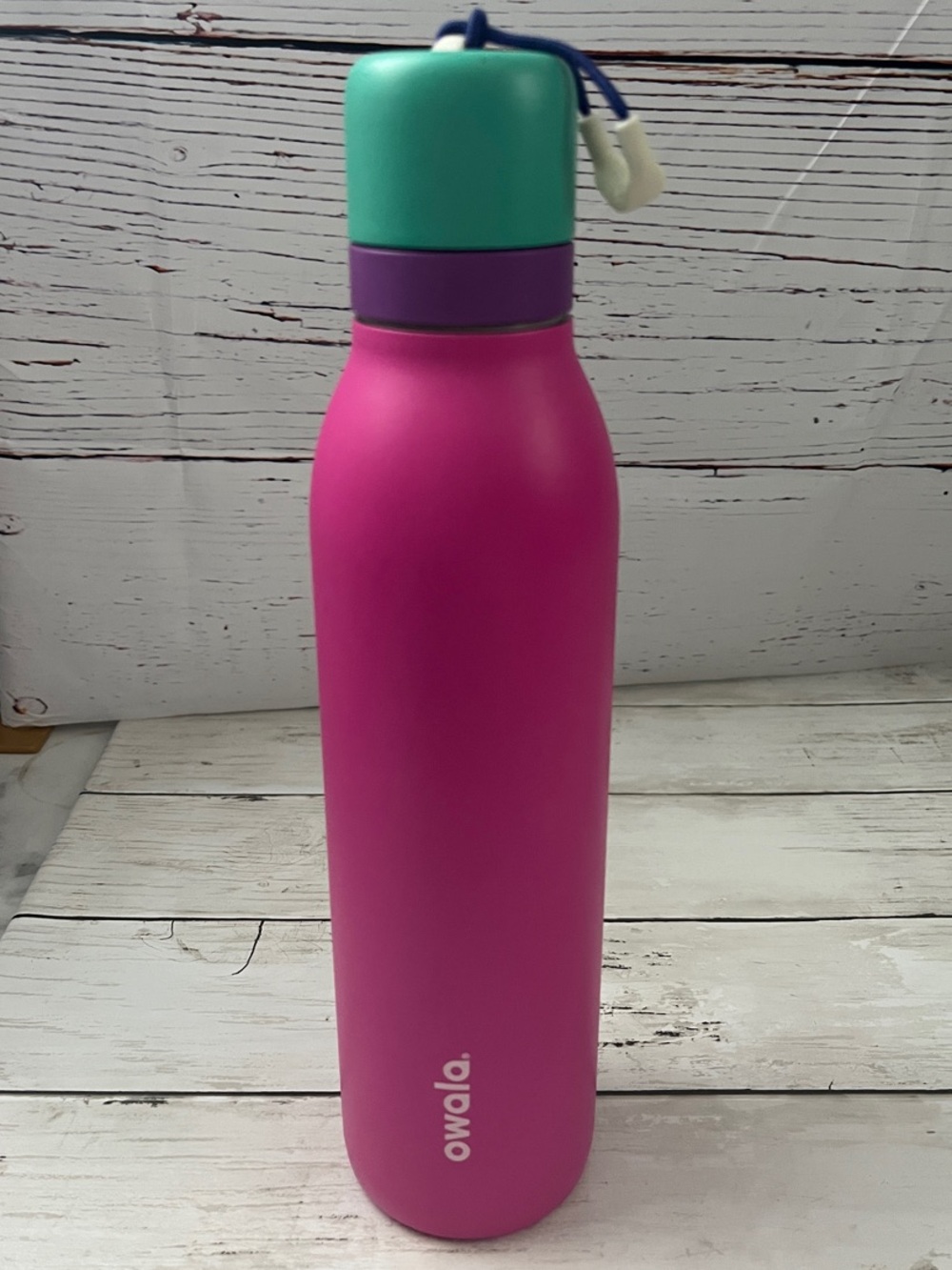 Owala Pink Stainless Water Bottle with Teal Cap